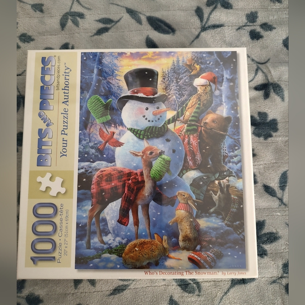 1000 piece puzzle "Who's decorating the Snowman"